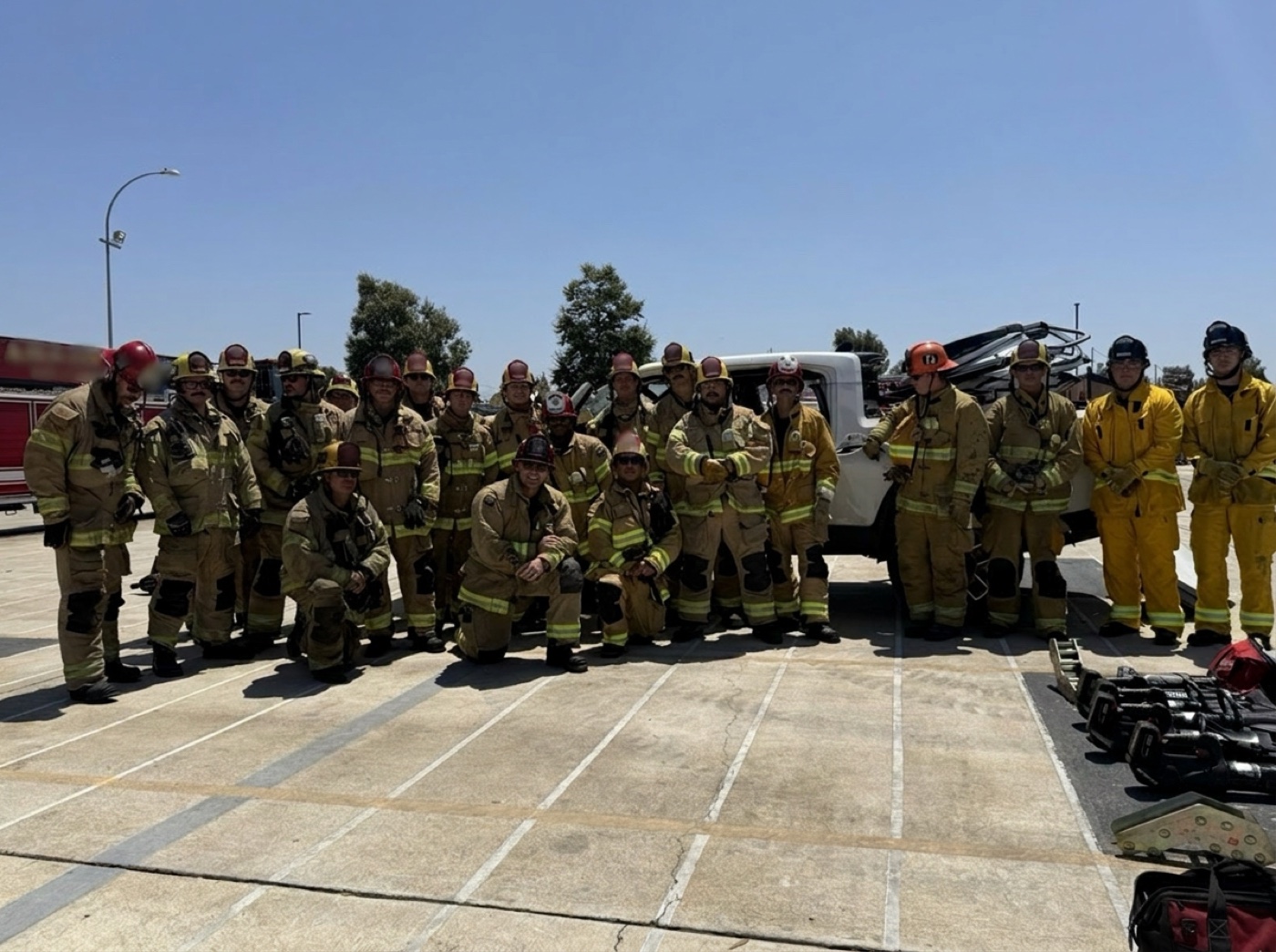 A class of firefighters after an extrication training session